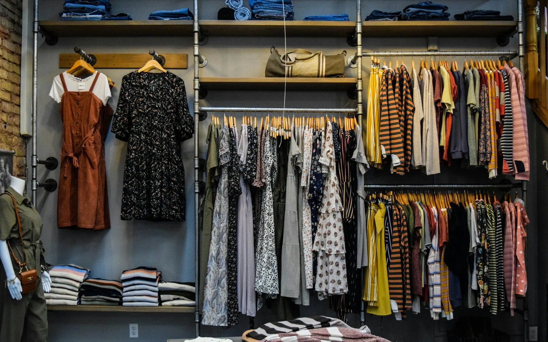 Boutique interior with clothing rails and shelves