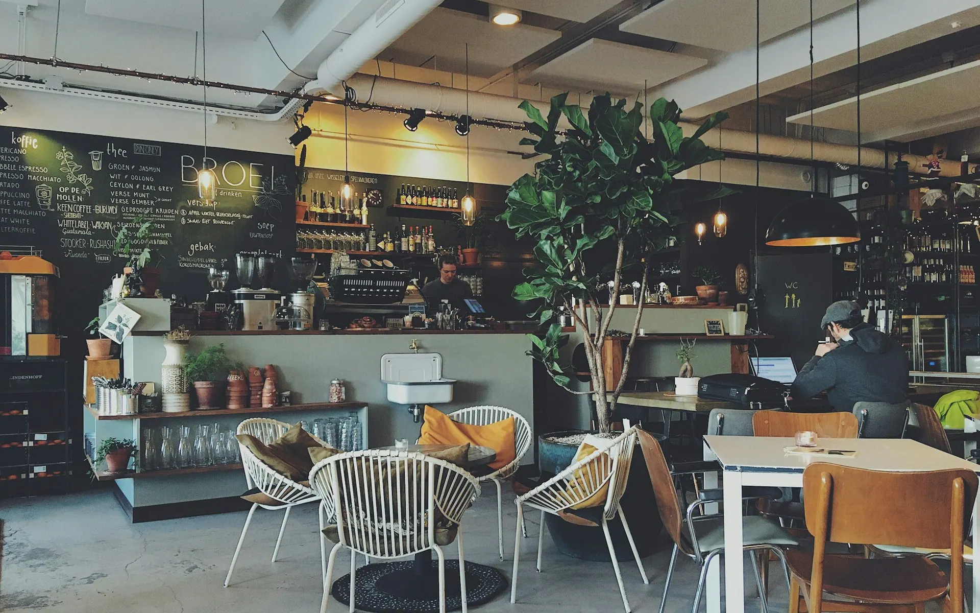 Empty cafe interior with tables and chairs