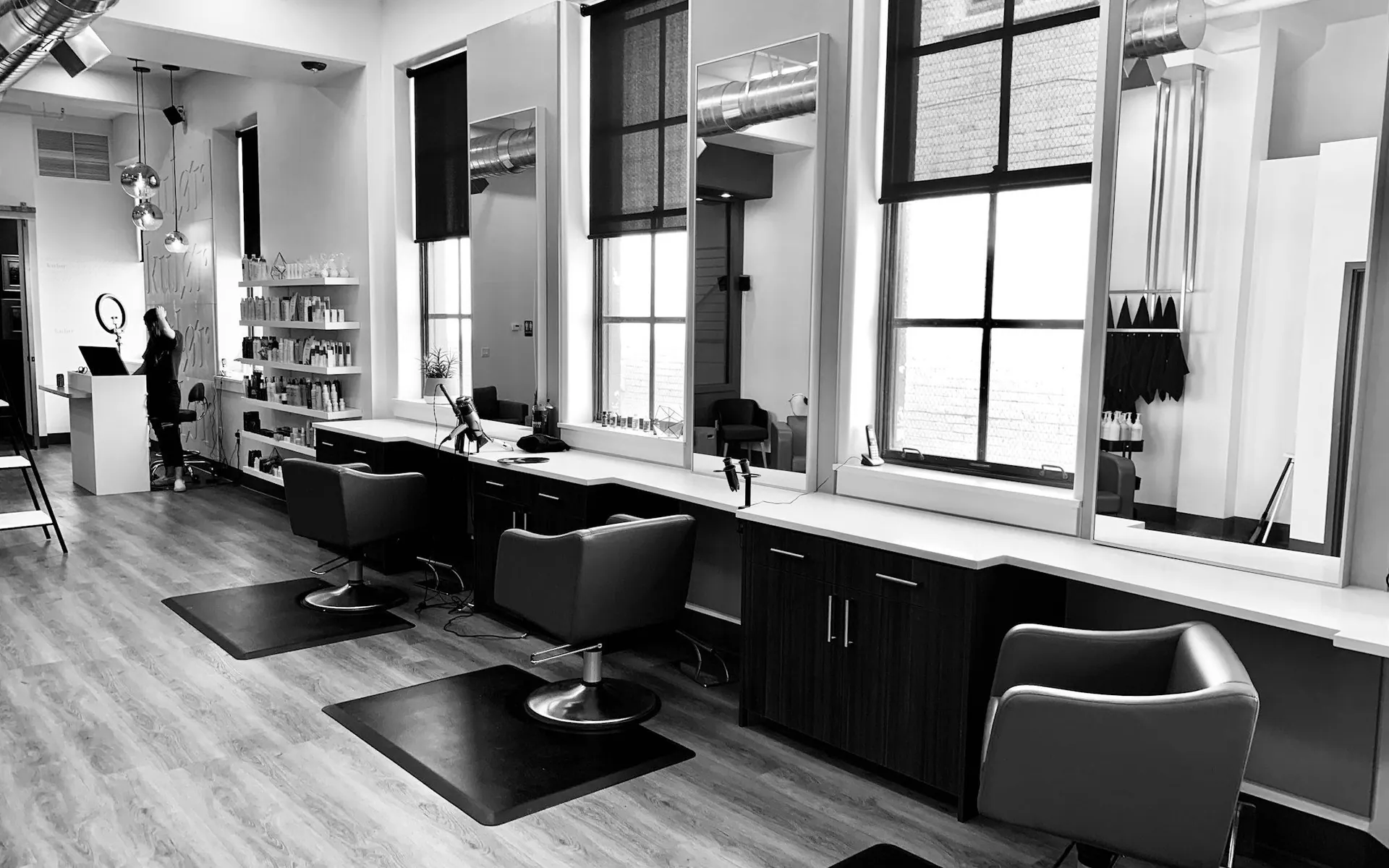 Salon interior with styling chairs and mirrors