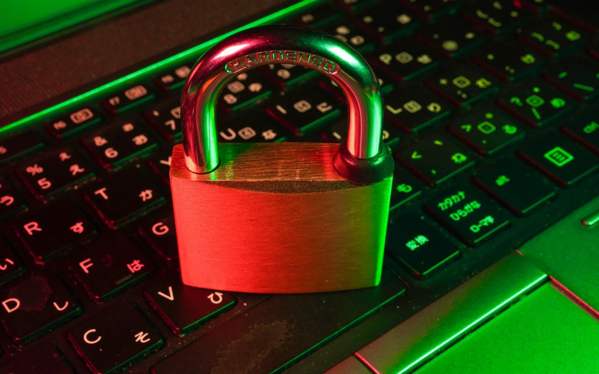 Padlock resting on a laptop keyboard
