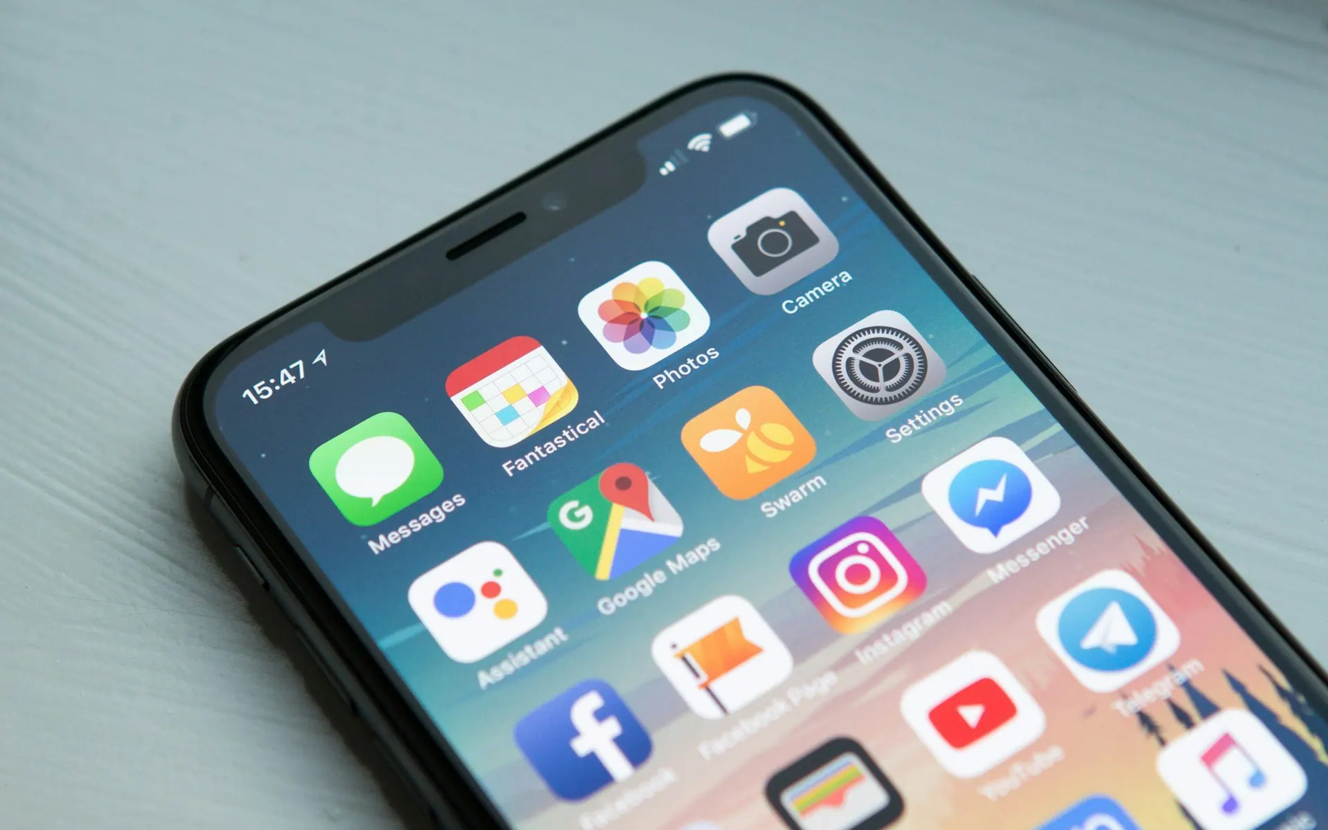 Smartphone home screen showing app icons