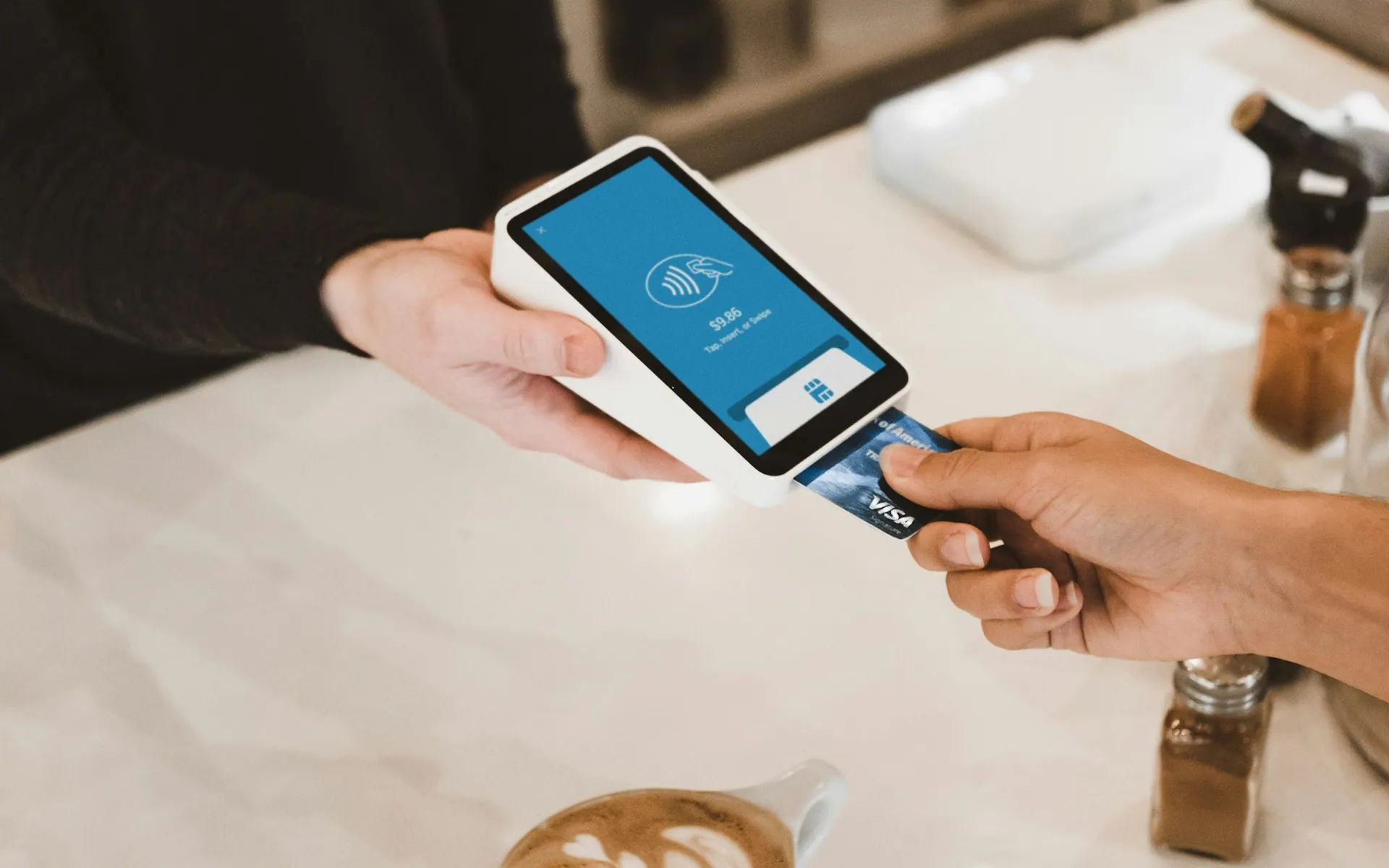 Card being tapped on a contactless payment terminal
