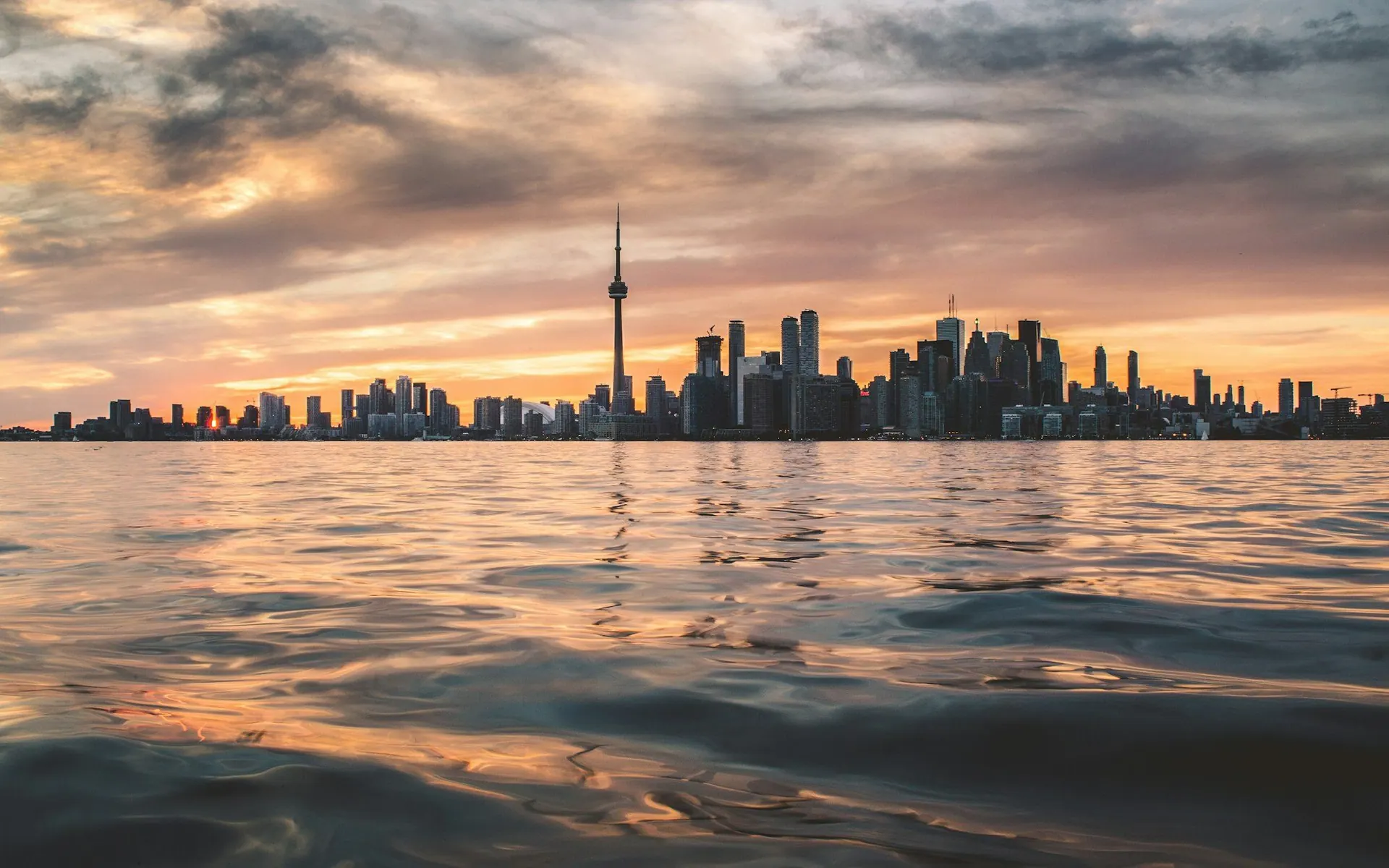 Toronto skyline at sunset seen across the water